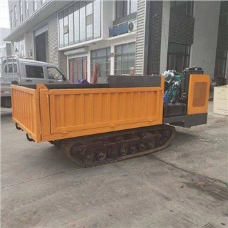 Väikesed roomikkallurid tõstekraanaga